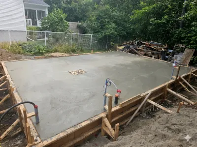 Coulage de dalle avec coffrage en bois